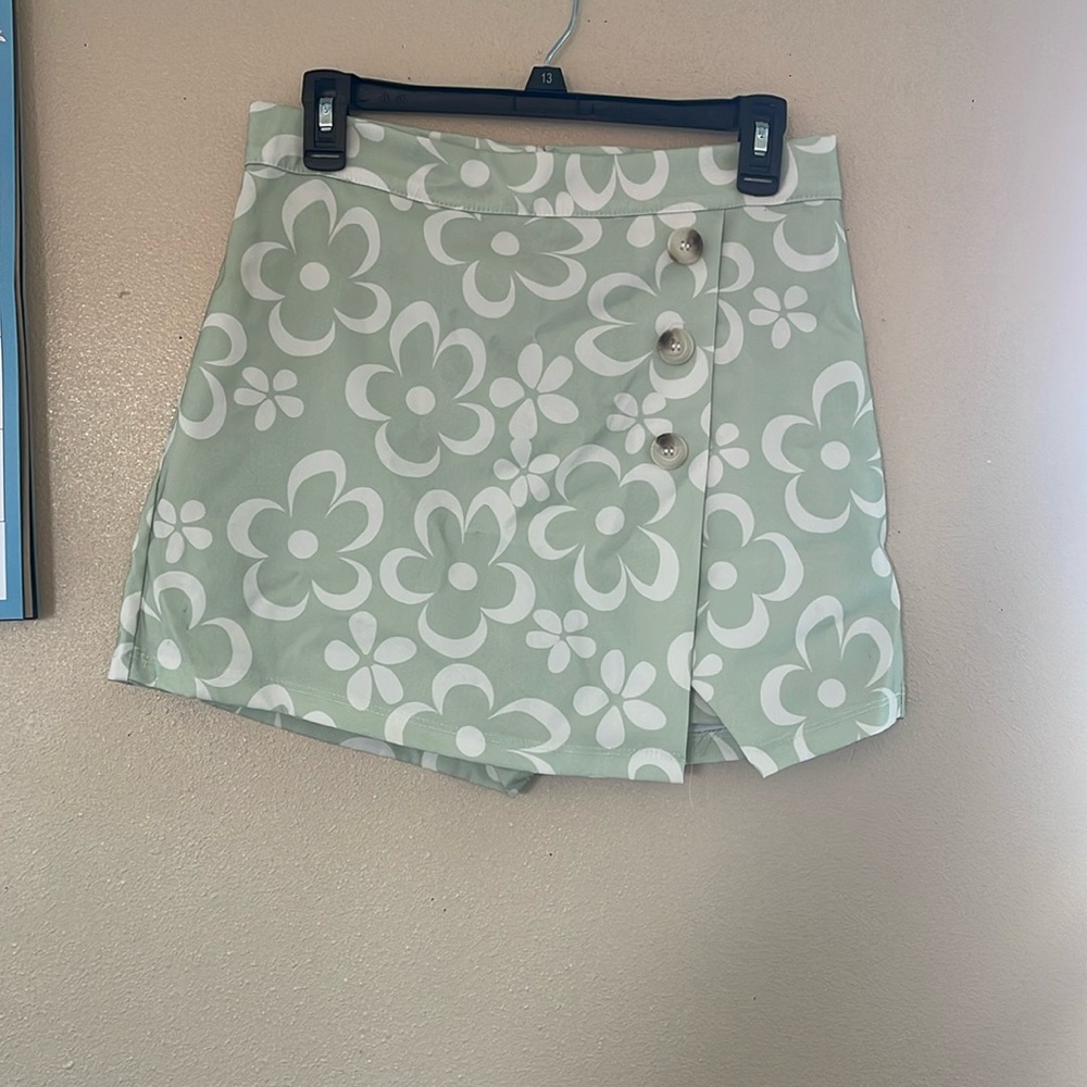 Green skort with white flowers